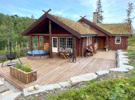 Cozy cabin on Lifjell with jacuzzi close to cross-country trails and hiking trails, stuga i Lifjell