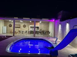 Casa con piscina y barbacoa, hotel in Rivera