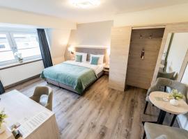 Hökis-Zimmervermietung 11 mit Küche, cheap hotel in Brande-Hörnerkirchen
