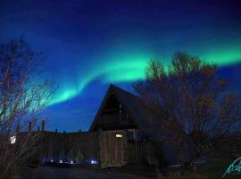 Cabin in Lava Village with hot tub, hotel en Selfoss