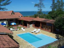 Casa de seis suites na beira do mar, hotel with parking in Rio das Ostras