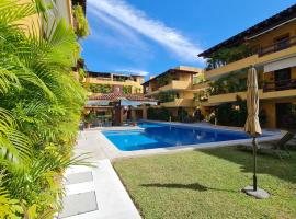 Relaxing ground floor 2 bed 2 bath appartment with pool walking distance from beach, leilighet i Zihuatanejo