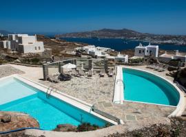 Gorgeous villa w ocean views and shared pools, Hotel in Ornos