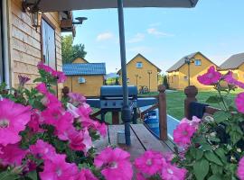 Grabska Osada SUN HOUSE - domki całoroczne ogrzewane, vakantiehuis in Grabce-Towarzystwo
