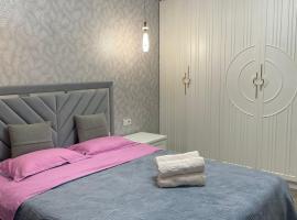 Nurai House, hotel med parkering i Almaty