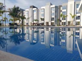 Bonito departamento planta baja en zona diamante, hotel med parkering i Barra Vieja
