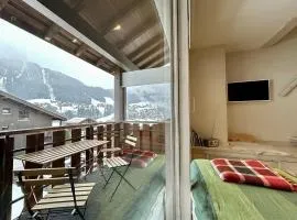 Duplex skis aux pieds centre village - 6 couchages - 2 salles de bain