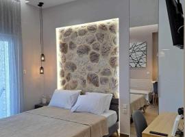 Eclectic Studio with Stone – dom przy plaży w mieście Ano Volos