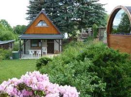 Ferienhaus mit Kamin , Terrasse und Aussensauna