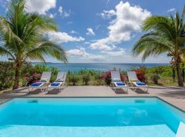 Seafront sunset & beach access, nyaraló Saint Martin-ban