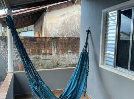Casa para temporada em um paraíso tropical, hotel in Cananéia