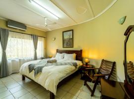 Room in Villa - Zambezi Family Lodge - Lion Room, מלון במפלי ויקטוריה