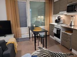 Moderni ja supermukava asunto! 65'Smart TV, Valokuitunetti, lähellä yliopistoa!, alojamento com cozinha em Lappeenranta