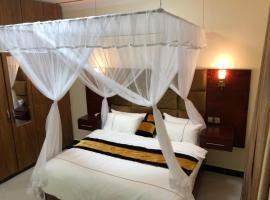 Lovely 2 Bed Apartment in Entebbe, икономичен хотел в Ентебе