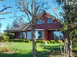 Casa sureña a pasos del lago