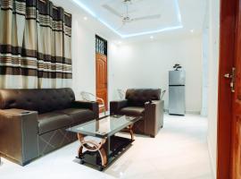 Woodpoint Apartments, overnachting in Dawhwenya