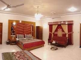 Travel lodge clifton, brunarica v mestu Karači