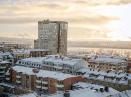 Guestly Homes - 1BR Harbor View Suite, Top Floor 9th, hotel v destinaci Piteå