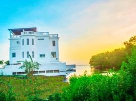 See Belize SUNRISE Sea View Studio with Infinity Pool & Overwater Deck, apartment in Belize City