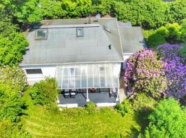 Ferienhaus mit Sauna, Whirlpool und Garten, casa rústica em Wuppertal