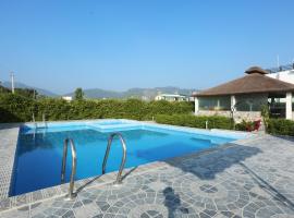 Hriday Bhoomi - Luxury Cottages & Villa in Jim Corbett, Ferienunterkunft in Jhirna