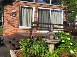 Le chalet du Golf à Rimouski, chalet de montaña en Rimouski