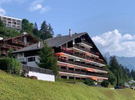 Crans Montana spacious 80m2 apartment with stunning view & bus stop outside, hotel in Crans-Montana