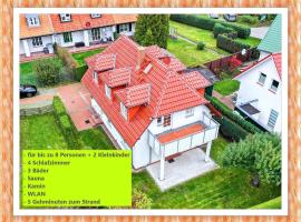 Haus Admiral mit Garten, 5 Gehminuten zum Strand, inklusive WLAN, Sauna, Kamin, Tischtennisplatte, Bollerwagen für den Strand, biệt thự ở Zingst