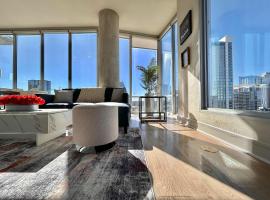 Indulge in Luxury Living 2 Bedroom Gem in the Heart of Austin with Pool, Gym, and Breathtaking Views，奧斯汀的飯店