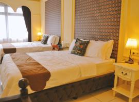 The Swarna Hotel Bayah Lebak, hotel com estacionamento 