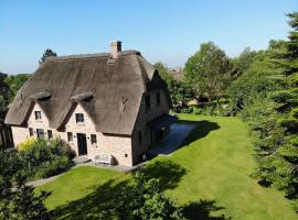 Reetdachhaus bei St Peter-Ording - Tating, отель в городе Татинг