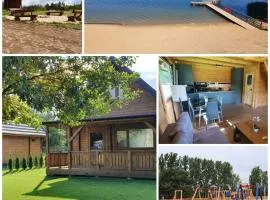 Domki z bala przy plaży Orle Jezioro Głuszyńskie