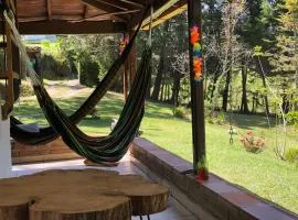 Casa Rustica con chimenea en su interior, rodeado de los cuatro elementos tierra, fuego, aire y agua, ubicada en sector tranquilo, para descansar en familia o amigos,