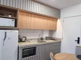 Apartamento ensolarado em condomínio clube