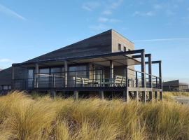 Luxury Beachfront Villa 4p - Uitzicht op de Baai & Duinen - Villa 19, hotel v destinaci Ouddorp