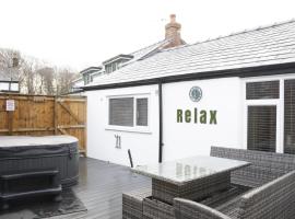 Botanic Cottages โรงแรมที่มีอ่างน้ำอุ่นในเซาท์พอร์ต