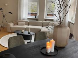 BG Living & Hosting - Exklusive Jugendstilwohnung an der Mosel in Ürzig - 2 Schlafzimmer, bis 4 Personen, Fahrradkeller, Waschmaschine & Trockner, khách sạn ở Ürzig