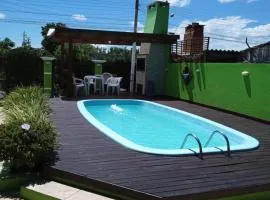 Casa com piscina no imbé