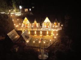 Snowind Cottages, hotel di Kūfrī