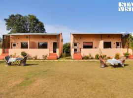 StayVista at Ranthambore Reverie - Near Ranthambore National Park with Lawn & Indoor-Outdoor Games, villa in Sawāi Mādhopur