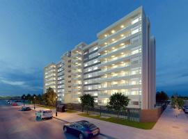 Depto nuevo en brisas del sol โรงแรมในตัลกาวาโน