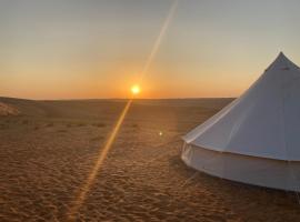 Desert Moments Glamping - full privacy, rental pantai di Al Mintirib