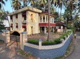 Al Falah Homestay Kasaragod, hotel con parcheggio a Kāsaragod