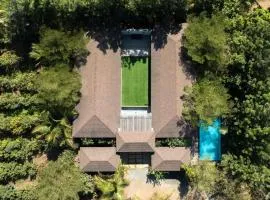 Farmhouse Retreat by StayVista - Classic architecture, Rustic interiors, Cozy rooms & A refreshing swimming pool