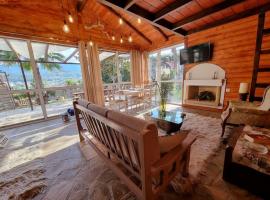 Ξύλινο Chalet Κτήμα Παππά, hotell sihtkohas Levádeia