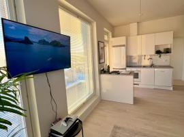 New 3-Bed Apartment & Free Garage parking & PS5, huoneisto Vantaalla