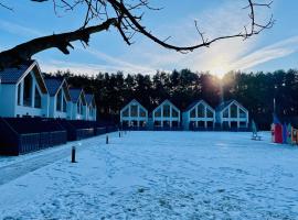 Domy Morskie Family Resort, hotel with hot tubs in Jantar