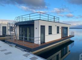 Hausboot Seensucht - LP14, hotel with parking in Laasow