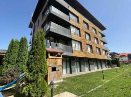 Charming comfortable apartment at Cornelia Deluxe Residence with free pool and SPA, lejlighedshotel i Razlog