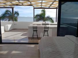 Puerto San Carlos Bay House & Tours -2nd Floor-, holiday home in San Carlos